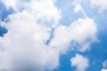 Fantastic soft white clouds against blue sky background
