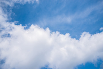 Fantastic soft white clouds against blue sky background