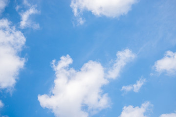 Fantastic soft white clouds against blue sky background