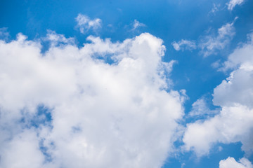 Fantastic soft white clouds against blue sky background
