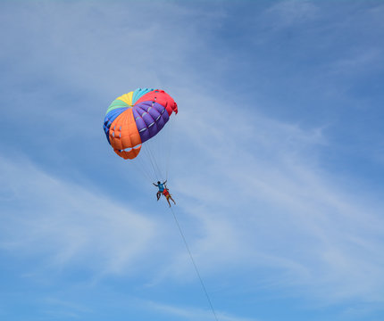 People playing parasailing in Phuket, Thailand