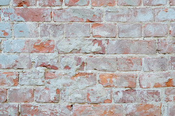 old plaster on a brick wall