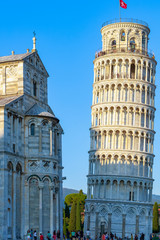 Sunlight hit on the top of the Leaning Tower and Pisa Cathedral in Italy