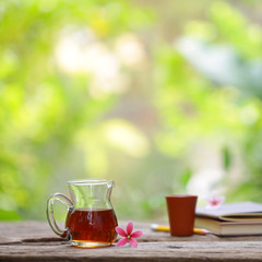 Red tea and plumaria flower