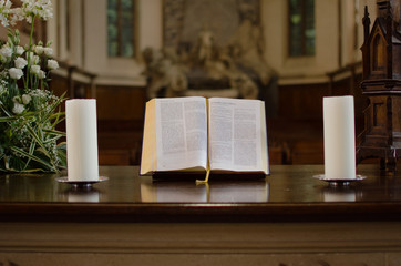 Open bible on the table in the church