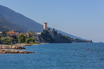 Picturesque view of the old castle on the rock in Malcesine, Garda Lake, Italy