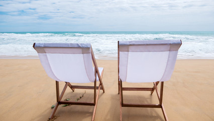 White beach chairs  on Karon Beach, Phuket, Thailand