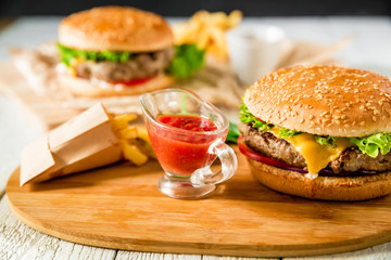 Classic tasty hamburger with beef and sauce. American food