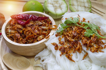 Thai style noodles with spicy chili, with a variety of fresh vegetables.