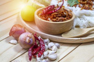 Thai style noodles with spicy chili, with a variety of fresh vegetables.