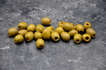 Olives on black background close up photo