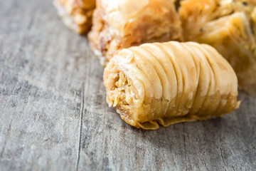 Turkish dessert baklava on wooden table
