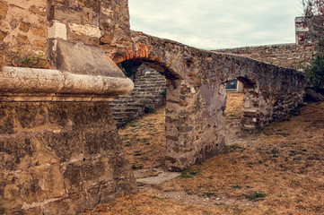 Fototapeta premium The picturesque stone walls of the ancient tunnel of the old fortress of Piran, Slovenia .