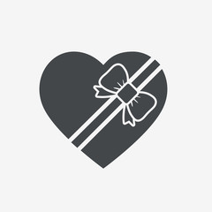 Gift box of heart tied with ribbon.