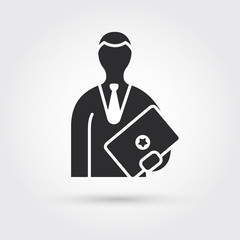 man standing with laptop