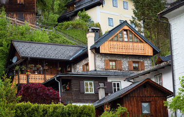 Typical Austrian Alpine houses with bright flowers, Hallstatt, Austria, Europe