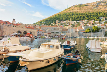 Fototapeta na wymiar SailBoats in Old port of Dubrovnik