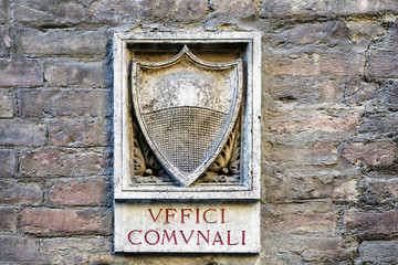 Uffici Comunali Street sign of wall Siena