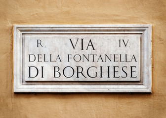 Obraz premium Via della Fontanella di Borghese sign on wall in Rome