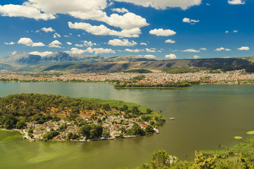 Obraz premium Giannena city in July clouds colors mountain lake Pamvotis, Epirus Greece