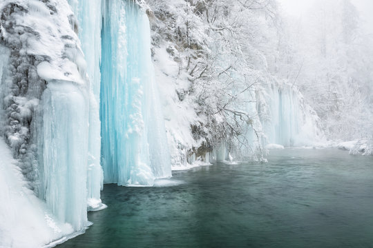 Frozen lakes and waterfalls in Plitvice Lakes National Park, Croatia
