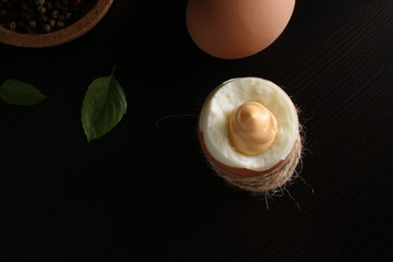 Boiled egg chicken wooden dark background