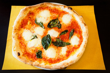 Margherita pizza in pizzeria of Florence