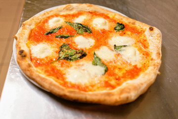 Margherita pizza in pizzeria at Florence