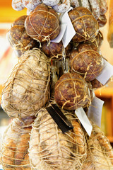 Cured italian smoked sausage  Bologna market