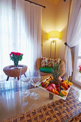 Wooden concept warm cozy hotel room decorated for guests