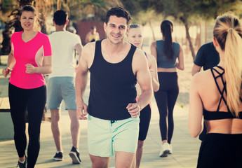 Fototapeta premium Active people during running training