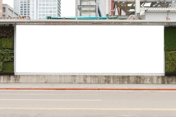 Large blank billboard on a street wall, banners with room to add your own text