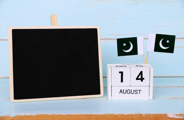 AUGUST 14 Wooden calendar Concept independence day of Pakistan and Pakistan national day.Copy space,minimal style