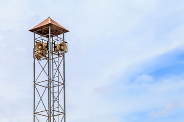 A Megaphone tower against the sky.