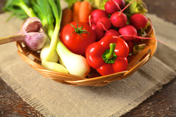 Fresh vegetables on a wooden table. Healthy food. Diet