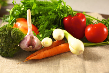 Fresh vegetables on a wooden table. Healthy food. Diet