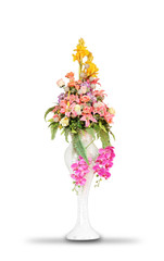 Multicolored flowers in a vase, isolated on white background with clipping path.