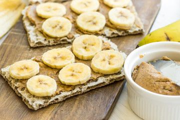 Healthy vegan dessert homemade peanut butter and banana sandwich with Swedish whole grain...