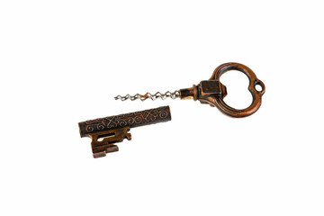 Old key corkscrew on white background