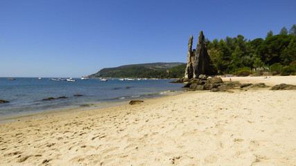 Rock formations at Albarquel beach in Setubal, Portugal