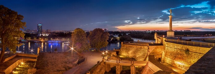 Kalemegdan fortress and Victor monument Belgrade, Kalemegdan fortress, Usce Sava and Danube confluence view by night - obrazy, fototapety, plakaty
