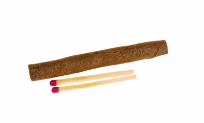 Cigarillos and matches on a white background