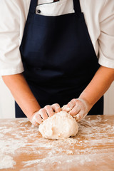 Chef preparing dough - cooking process