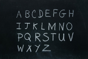 Alphabet letters written in chalk