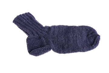 Black knitted sock over white background