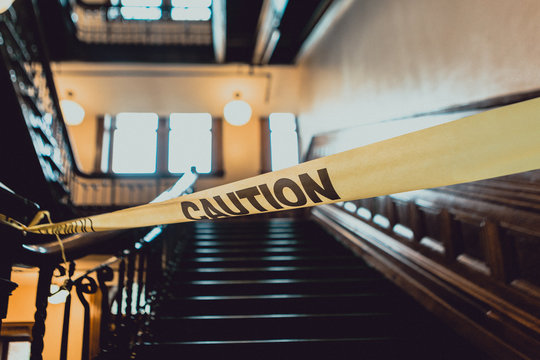 Caution Tape in Front of Stairs