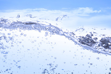 Wave of drinking water and bubble air white sky background.