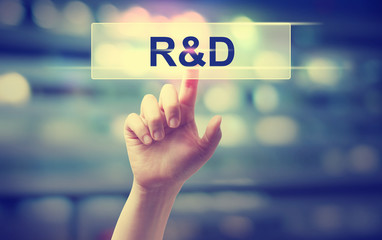 R and D concept with hand pressing a button 