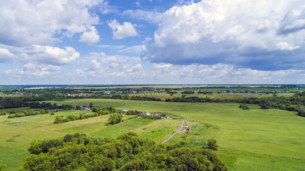 Fototapeta na wymiar Rural landscape from height in June, Russia