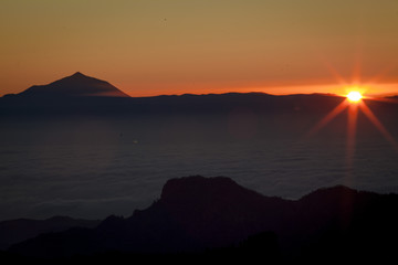 Beautiful sunset in the mountains. Canary Islands. The top of Terenif